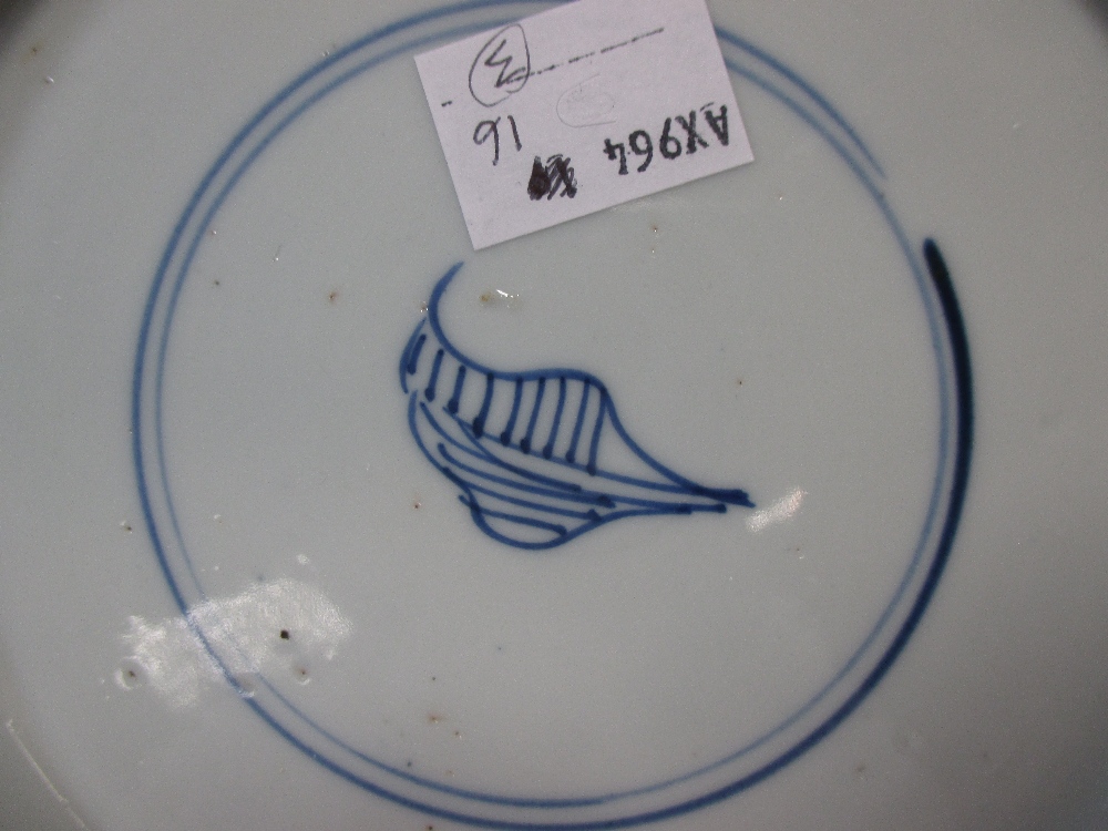 A Kangxi blue and white plate the rim with lappet panels of flower stems on a cracked ice ground and - Image 4 of 5