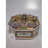 A Dresden porcelain octagonal inkstand, fitted with two seals and three compartments, painted with