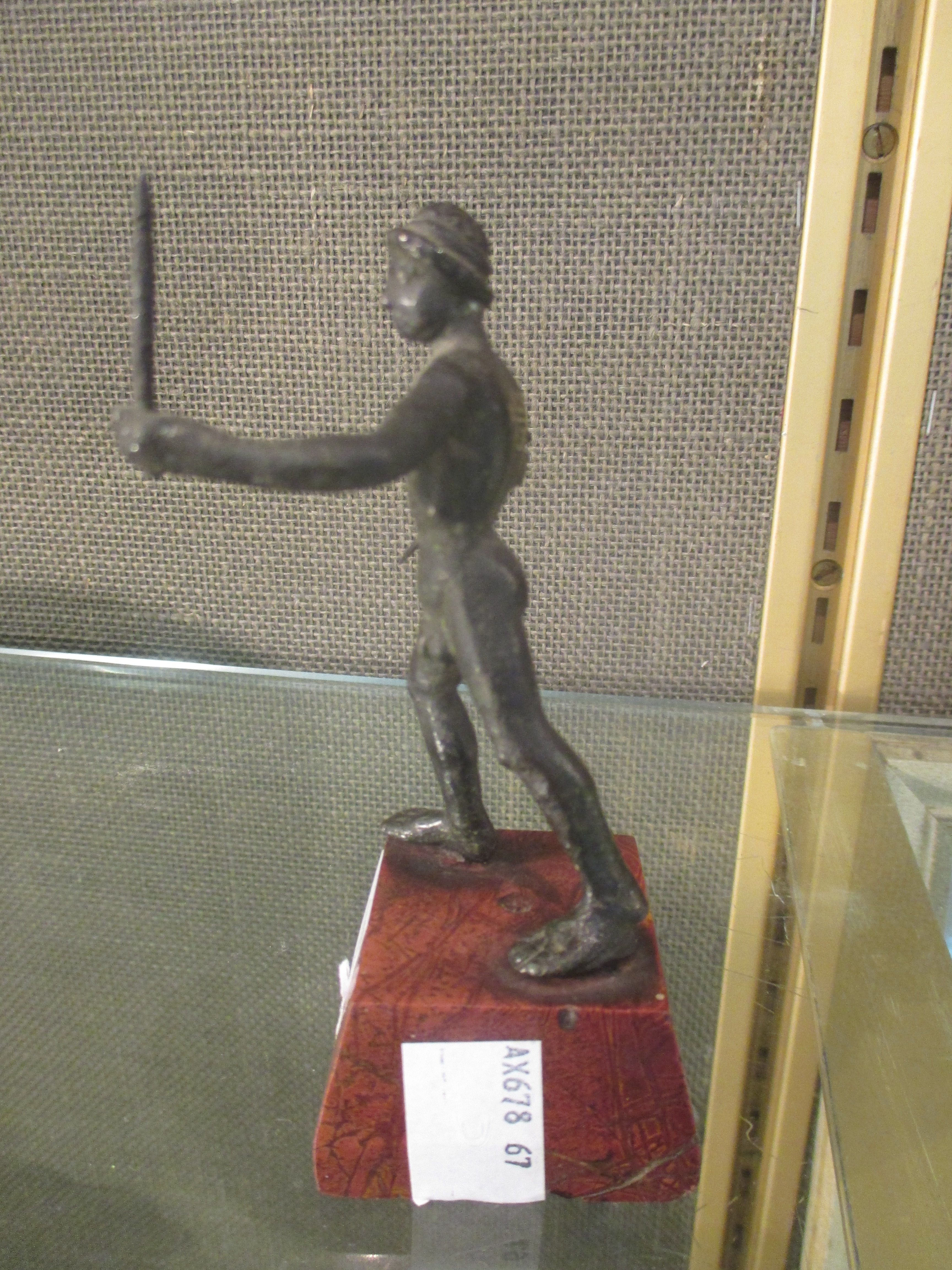 A small bronze after the Antique of a standing man holding swords - Image 4 of 6