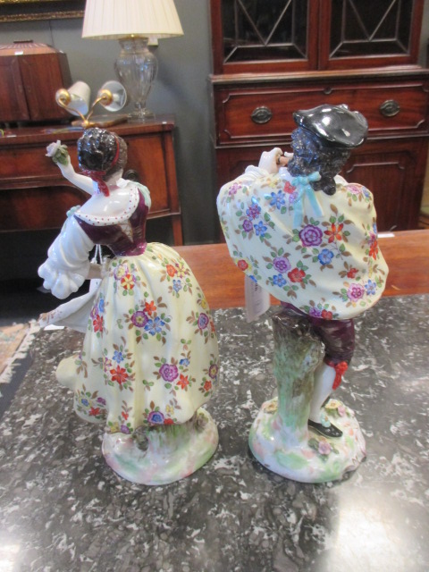 A pair of late 19th century Continental porcelain figures of a man and wife, 24cm high - Image 3 of 3