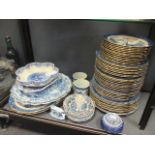 A Booths 'Old Willow' pattern dinner service together with other blue and white wares