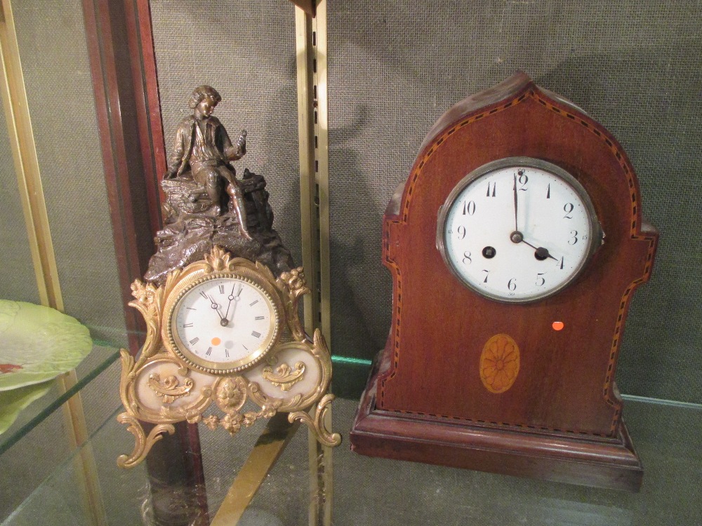 An Edwardian mahogany mantel clock, together with a spelter case clock (2)