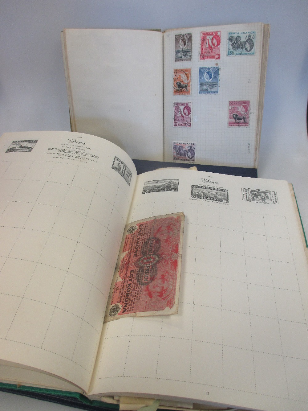 A quantity of stamp albums and catalogues