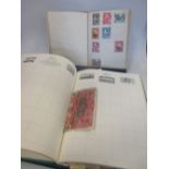 A quantity of stamp albums and catalogues