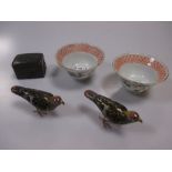 A Japanese bronze box, a pair of Chinese enamel bird figures and two Chinese tea bowls (5)