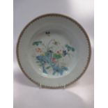 An 18th century Chinese famille rose plate with three geese by lotus, 23cm wide