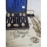 A small quantity of silver, mostly spoons, to include a cased set of silver teaspoons with sifter