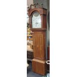 An oak longcase clock with eight day movement and painted dial