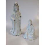 An 18th century blanc de Chine seated Guanyin 18cm high and a standing Guanyin 33cm high (2)
