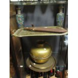 A large antique brass water carrier, three Eastern brass trays, a Sheffield steel machete & a pair