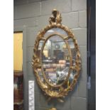 A pair of 18th Century-style oval giltwood framed mirrors (2)