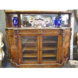 A 19th century mirror back walnut credenza