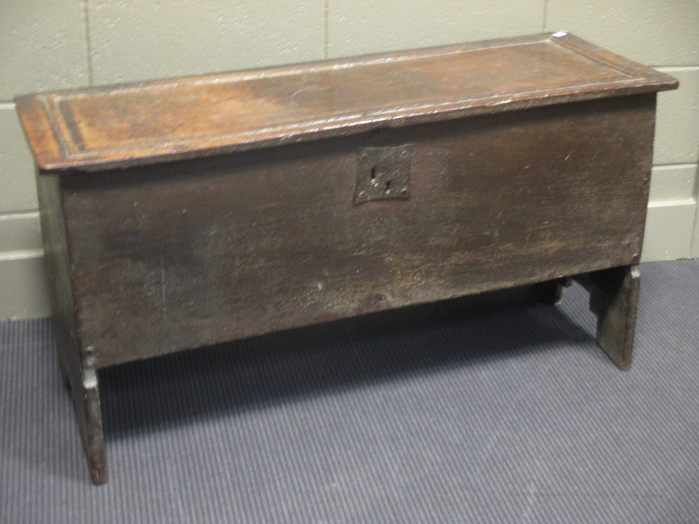 An 18th century oak boarded chest, 58 x 109 x 39cm