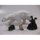 A Royal Copenhagen polar bear, a resin greyhound group, a jade polar bear and a china otter (4)