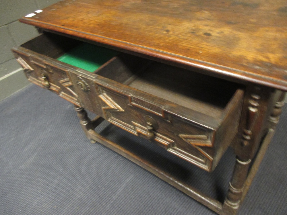 A late 17th century oak side table with geometric moulded drawer fronts, 70 x 93 x 53m - Image 2 of 2