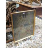 A tapestry fire screen, 72cm high