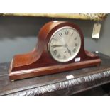 A Junghans oak case three train gong chiming mantel clock, and another mahogany case chiming