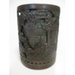 A Chinese copper relief cast cylindrical brush pot