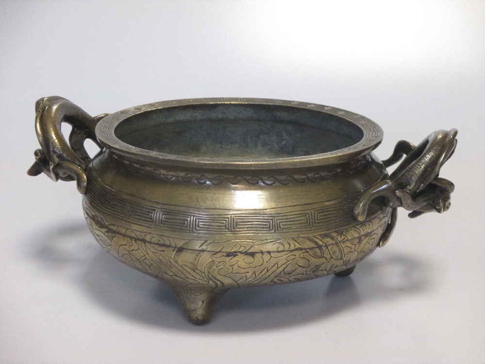 A Chinese bronze two handled censer