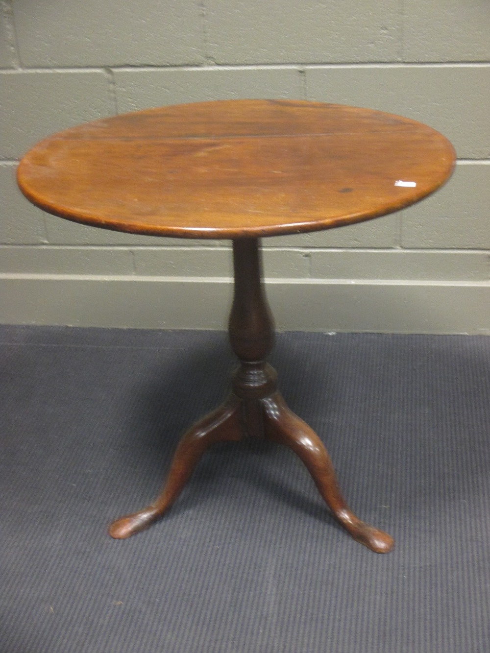 A George III mahogany tilt-top tripod table, 70cm high