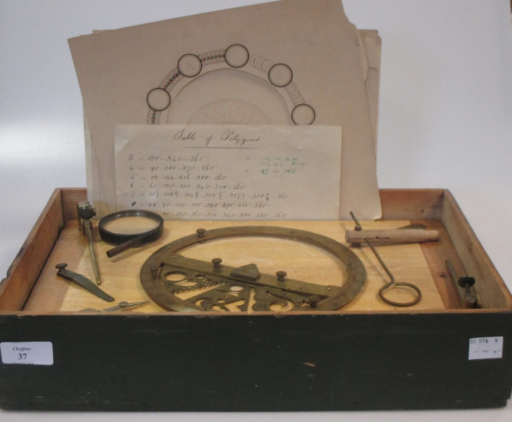 A brass spirograph made up from a 19th century protractor and drawing instruments