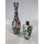 A limited edition 'Clematis Queen' pattern Moorcroft vase, No 149/200, boxed, together with