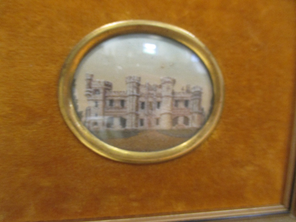 A Victorian sand picture of a castle, in a transverse oval frame, 5 x 6 cm