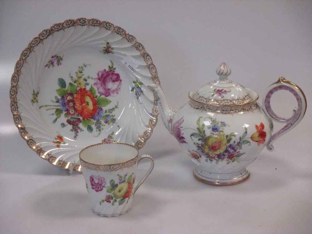 A large quantity of Dresden floral printed teawares, inc. two teapots, two hot water jugs, plates,