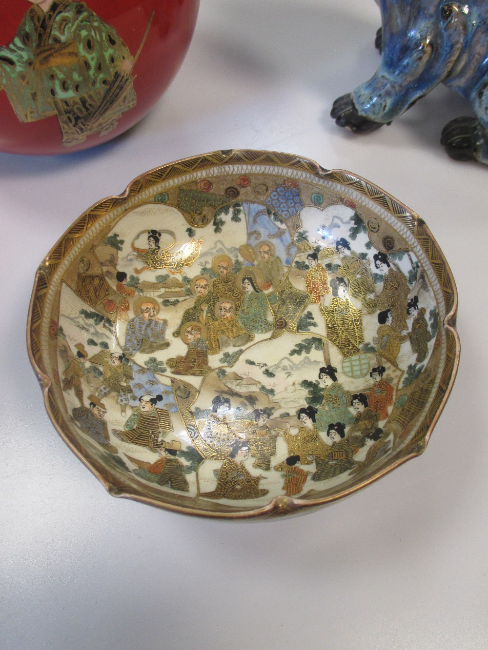 A Satsuma bowl decorated with geisha and immortals within a landscape together with a porcelain - Image 2 of 4