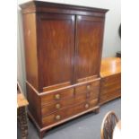 A George III mahogany linen press with slides, on swept bracket feet, 203 x 132 x 61cm