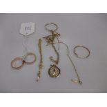 A quantity of jewellery stamped '585' including two rings, two bracelets, two pendants, a chain