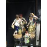 A set of four porcelain figures representing the seasons, after the original models by Derby, and