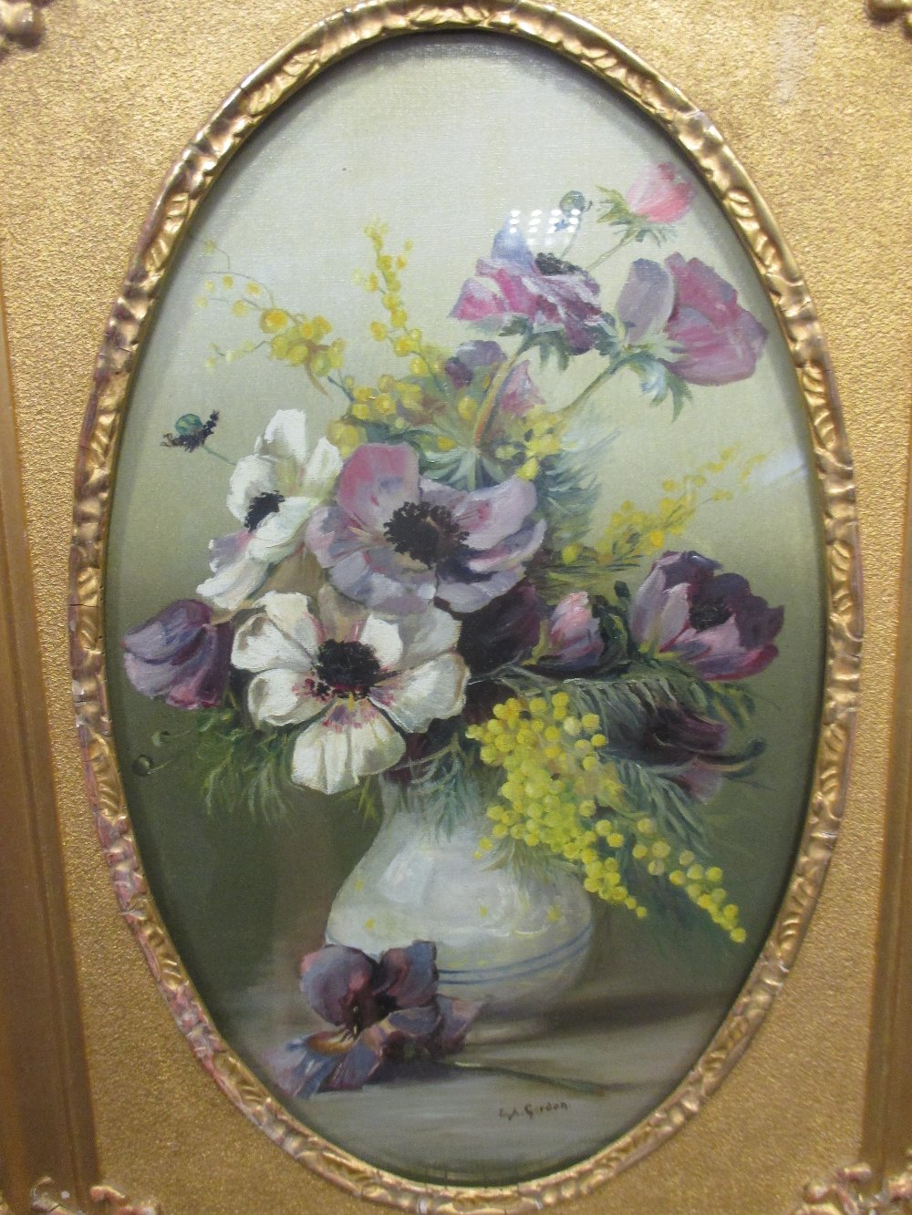 E. A. Gordon (British, 20th century) Gerberas in a vase, signed, oil on canvas, 49 x 30cm