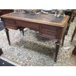 A Victorian 'fiddle back' mahogany library table