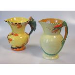 Various early 20th century pottery yellow ground jugs with dragon/bird handles (6)