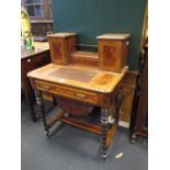 A Victorian walnut work table