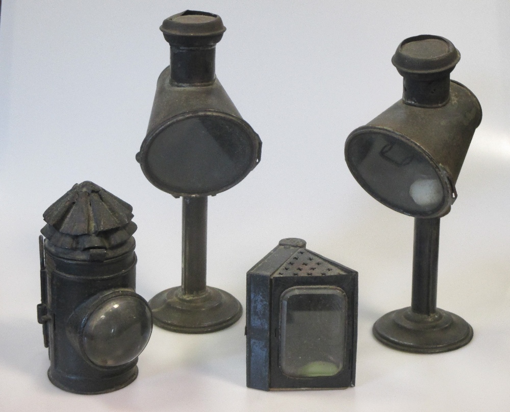 A pair of candle lamps, a hand-held miner's lamp and another, Hebbert & Co, refurbished Farwic