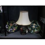 A modern Moorcroft table lamp and two Moorcroft chargers (3)