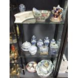 A collection of porcelain to include a garniture of Chinese blue and white vases, famille rose bowl,