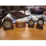 Three mid 20th century mantel timepieces by Elliott, London and a balance wheel mantel timepiece