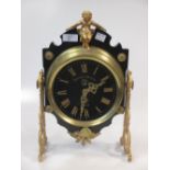 A French gilt metal and ebonised timepiece