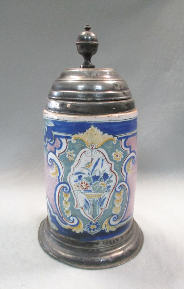 An 18th century German faience and pewter mounted tankard, the cylindrical body decorated with a - Image 6 of 6