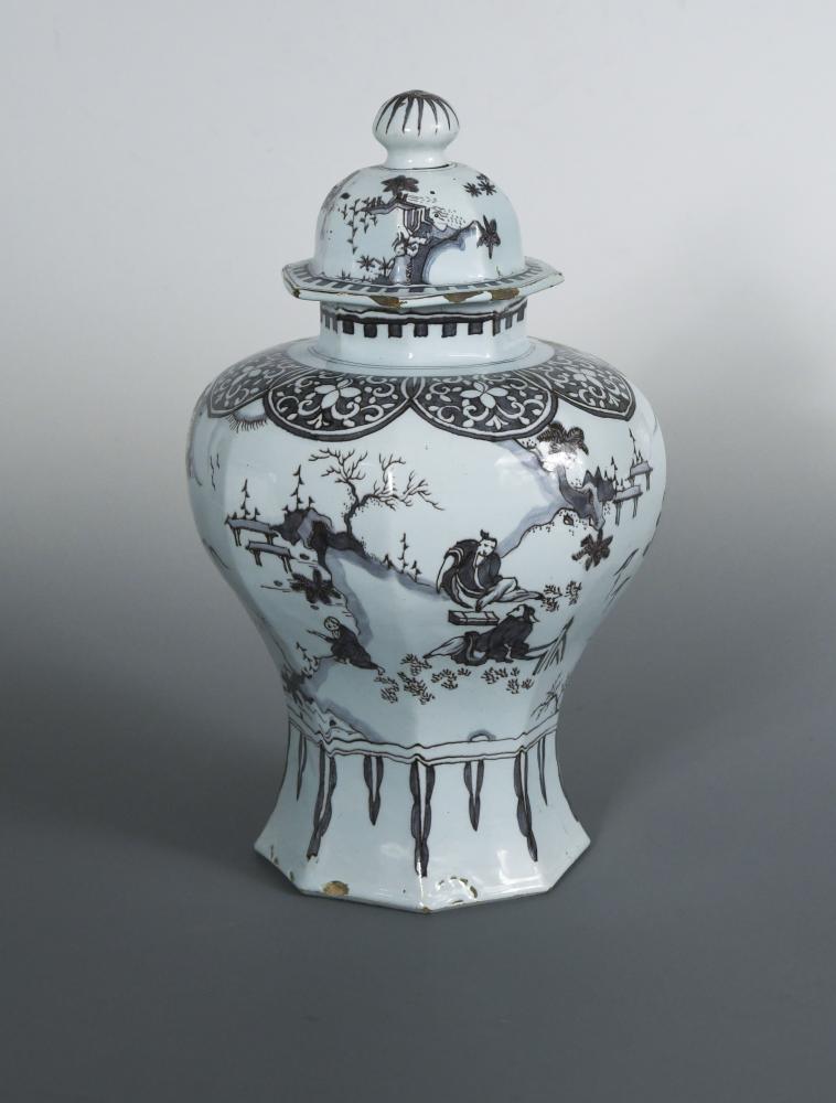 An Delft vase and cover, circa 1710, of hexagonal baluster form, painted in manganese in the Chinese