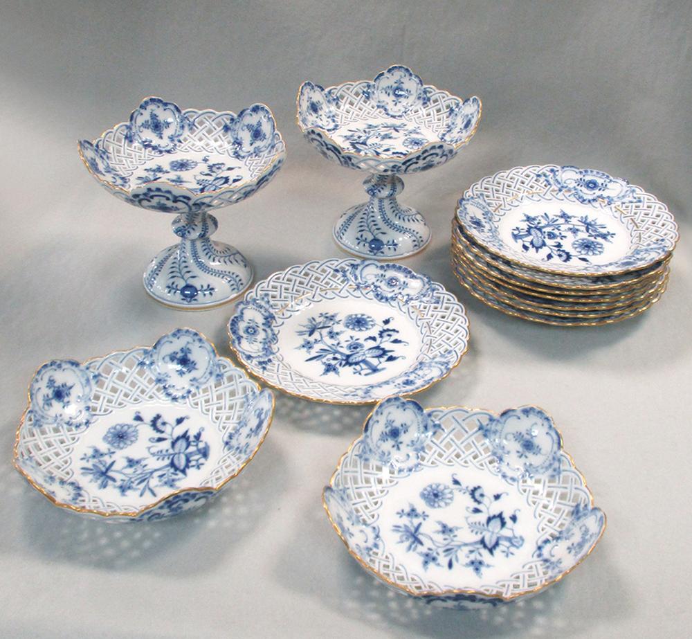 A Meissen blue and white onion pattern dessert service, circa 1900, comprising two pedestal