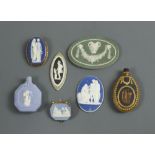 A group of Wedgwood jasperware, 18th century and later, to include a green jasperware oval plaque,
