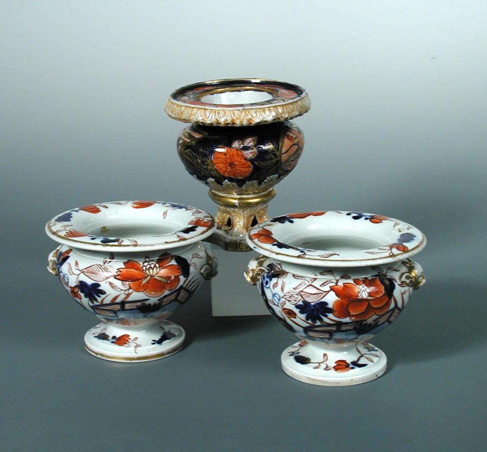 A rare pair of Mason's 'Japan Fence' pattern two handled pedestal salts, circa 1815, with shouldered