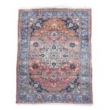 A fine Kashan rug with soft madder field 156 x 106cm (61 x 41in) Some localised areas of low pile