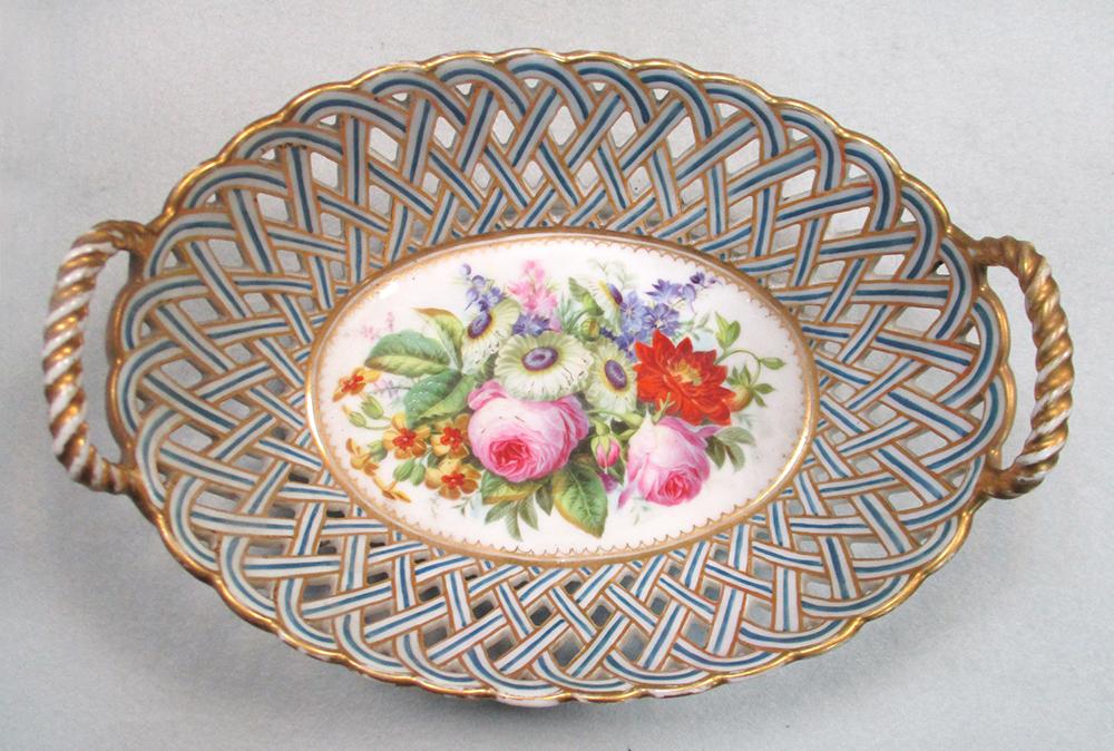 A 19th century English porcelain two handled pierced basket, the centre painted with a bouquet of - Image 2 of 3