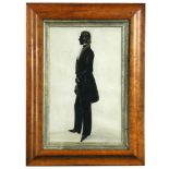 English School, early 19th Century Portrait of a gentleman in a frock coat, cut and bronzed, 26.5