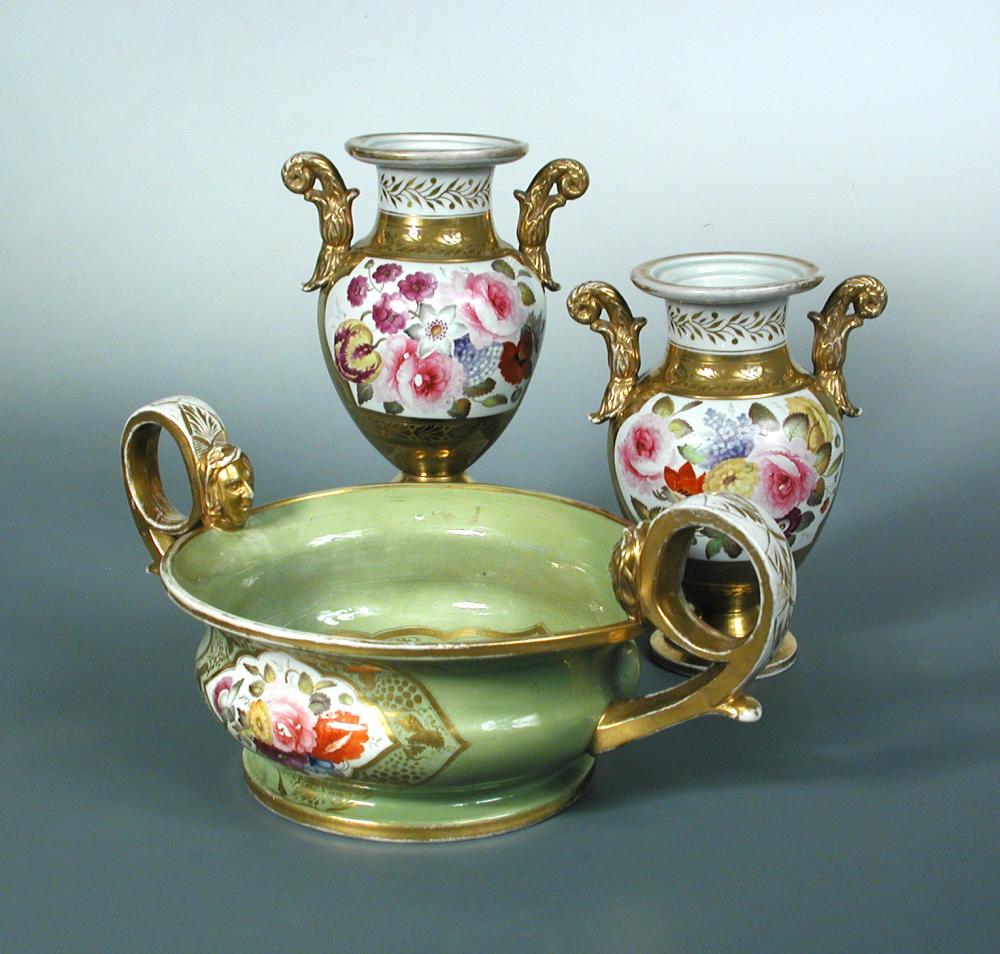 A pair of Miles Mason two handled vases, circa 1810, the shouldered ovoid bodies painted with panels